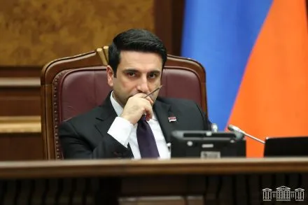 աժ